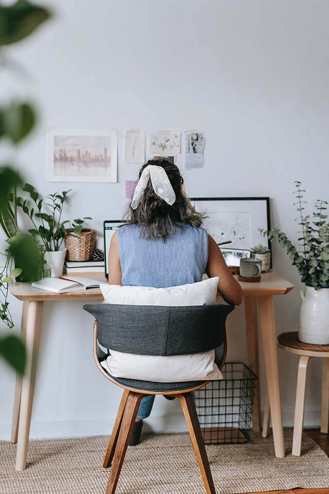 A comopany-issued laptop in a remote employee's home